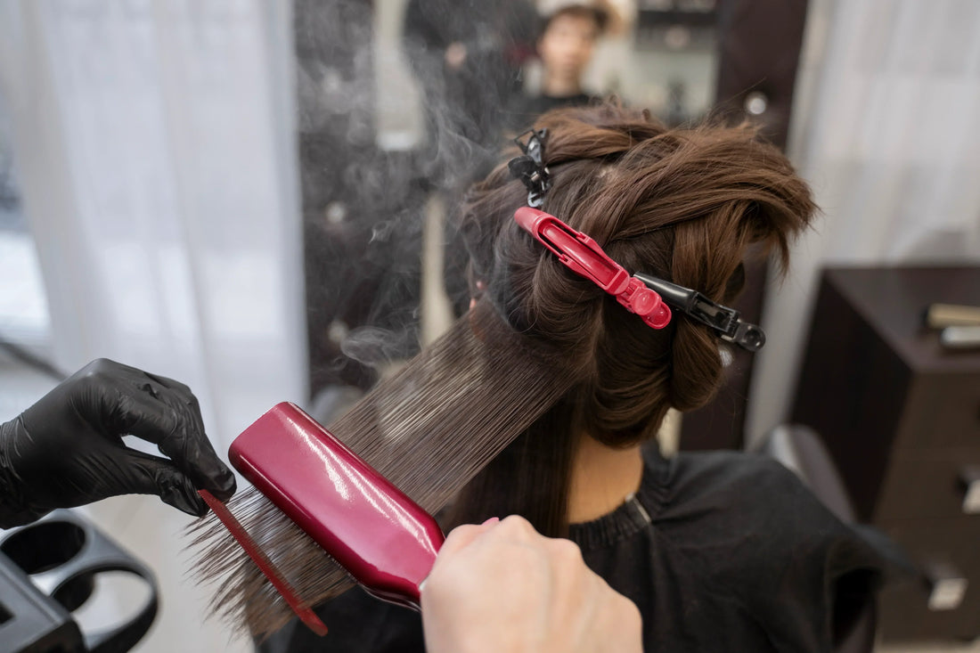 Hair Rebonding process showing a stylist smoothing hair with a flat iron in a salon.