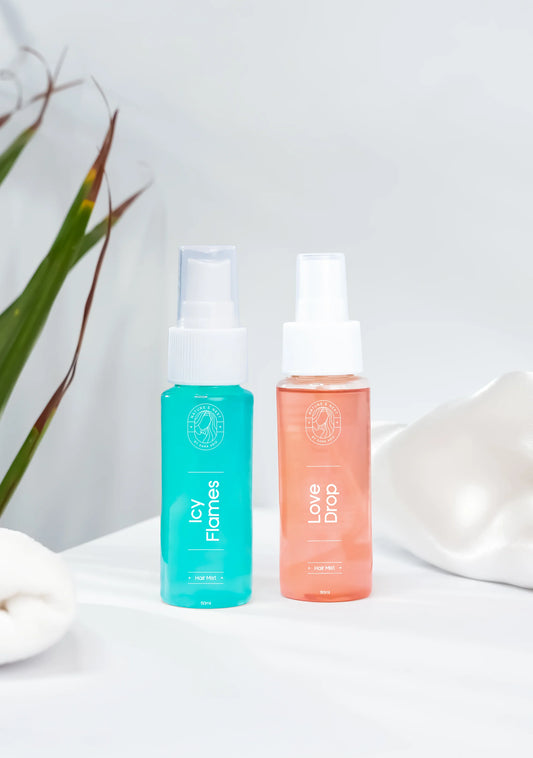 Love and Fire hair mist duo featuring Icy Flames and Love Drop bottles on a white surface.